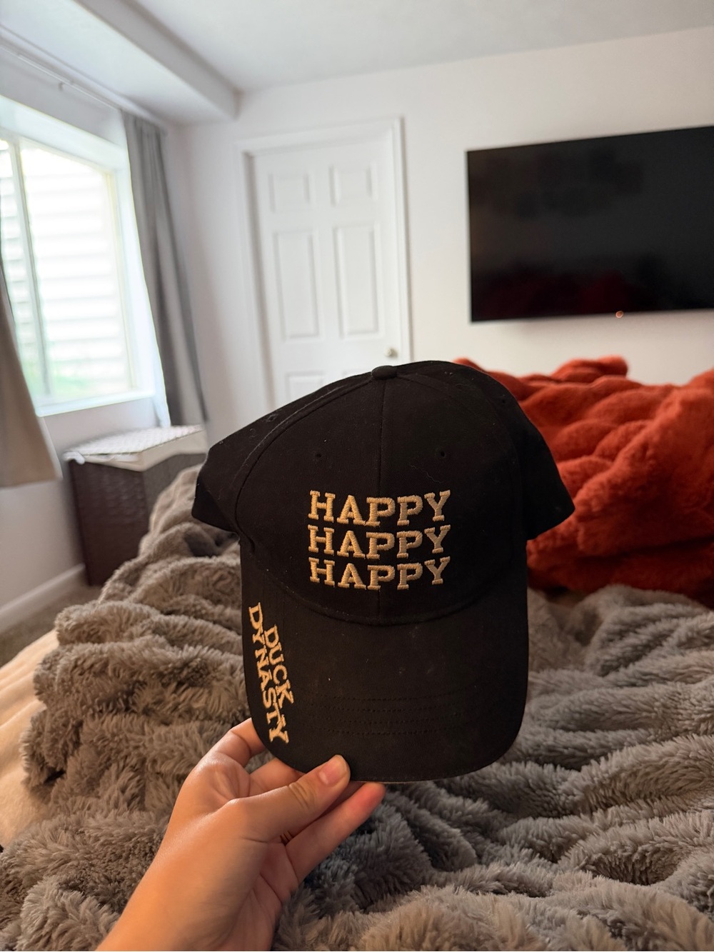 Black Baseball Cap with Gold "HAPPY HAPPY HAPPY" Embroidery